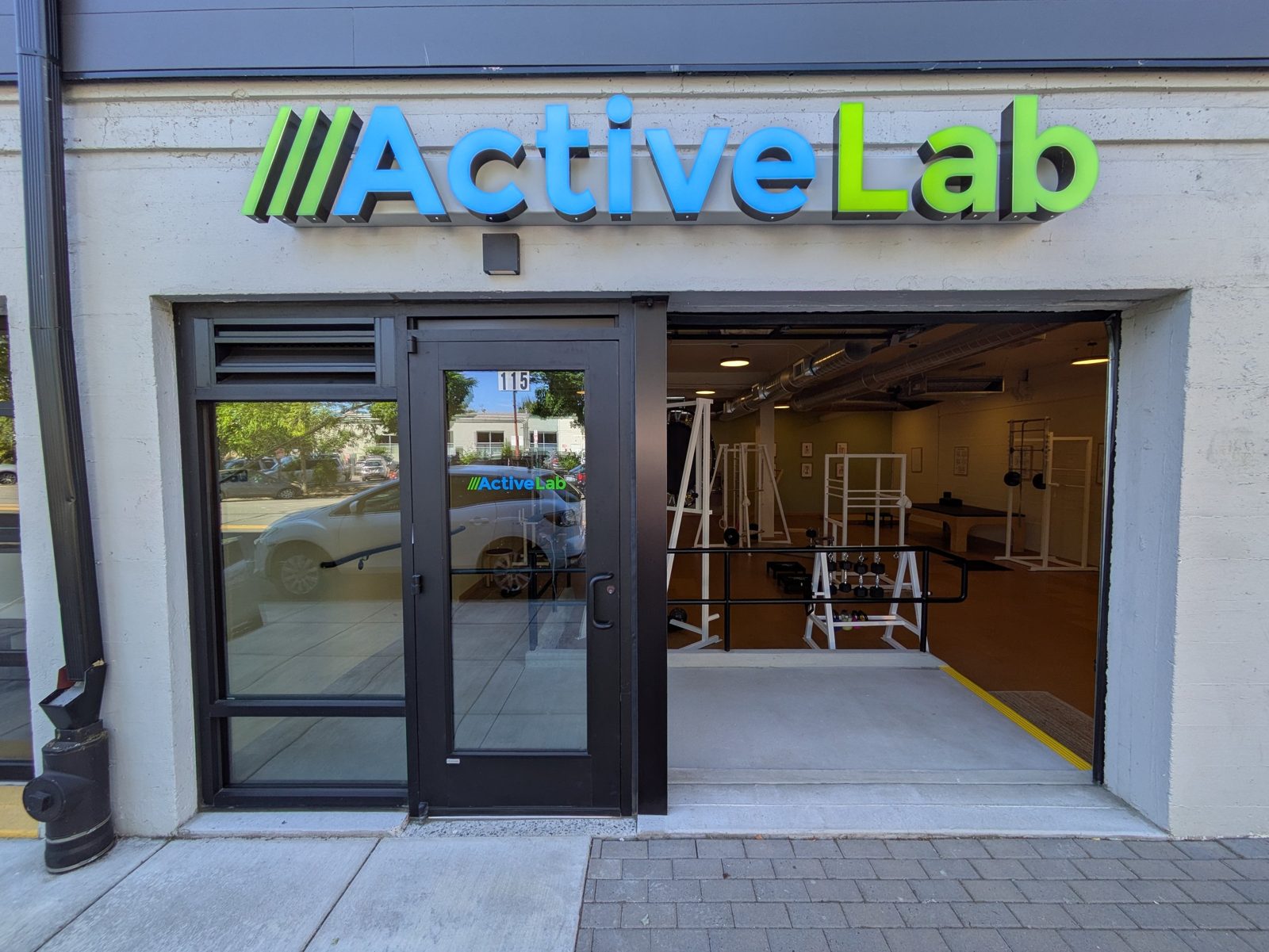 Photo of the front of ActiveLab gym, entrance, and sign in Vancouver, WA